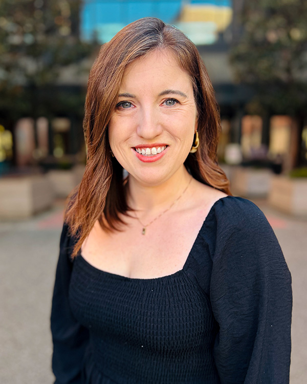 A portrait of Olivia Ruiz, Director of People